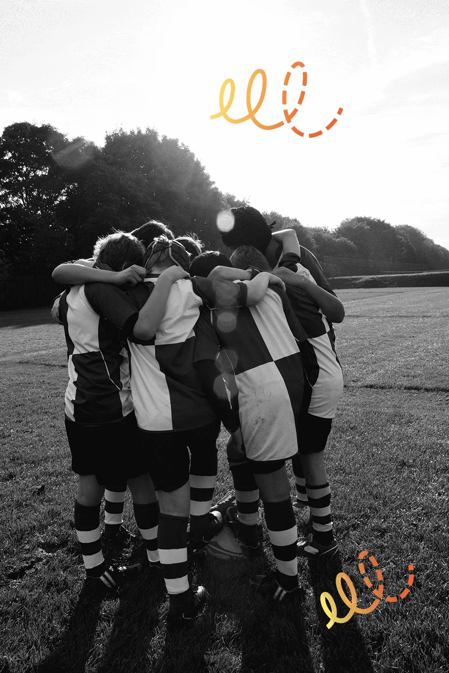 Équipe de rugby d'écolier adolescent en huddle avec motif graphique