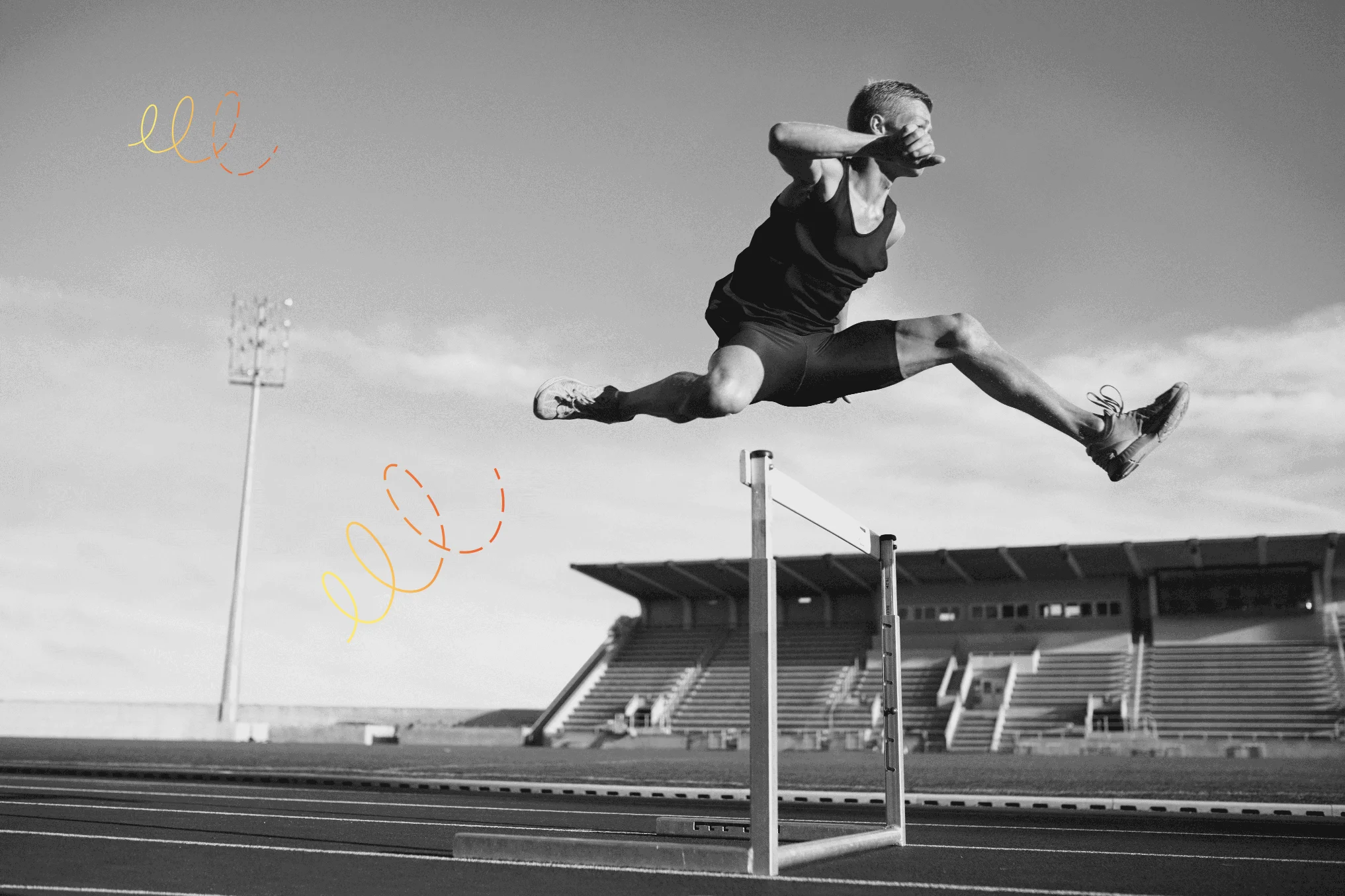 Sprinter professionnel sautant par-dessus un obstacle avec motif graphique